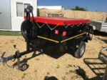 Semi-Tipping Trailer with Winch Assistance