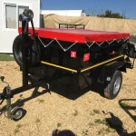 Semi-Tipping Trailer with Winch Assistance